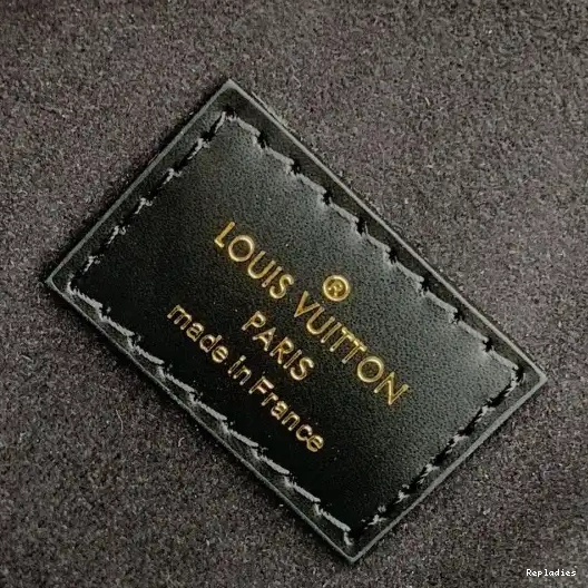 Rep VUITTON TOUPIE LOUIS 0212